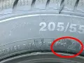 Nahaufnahme eines Reifens mit der Kennzeichnung 205/55 R16. Deutlich sichtbar ist das M+S Symbol, das auf einen Ganzjahresreifen hinweist.
