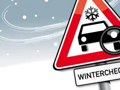Warnschild mit Schneeflocke und Auto, Lupe zeigt auf Reifen. Darunter steht "WINTERCHECK". Bereiten Sie Ihr Fahrzeug auf den Winter vor!
